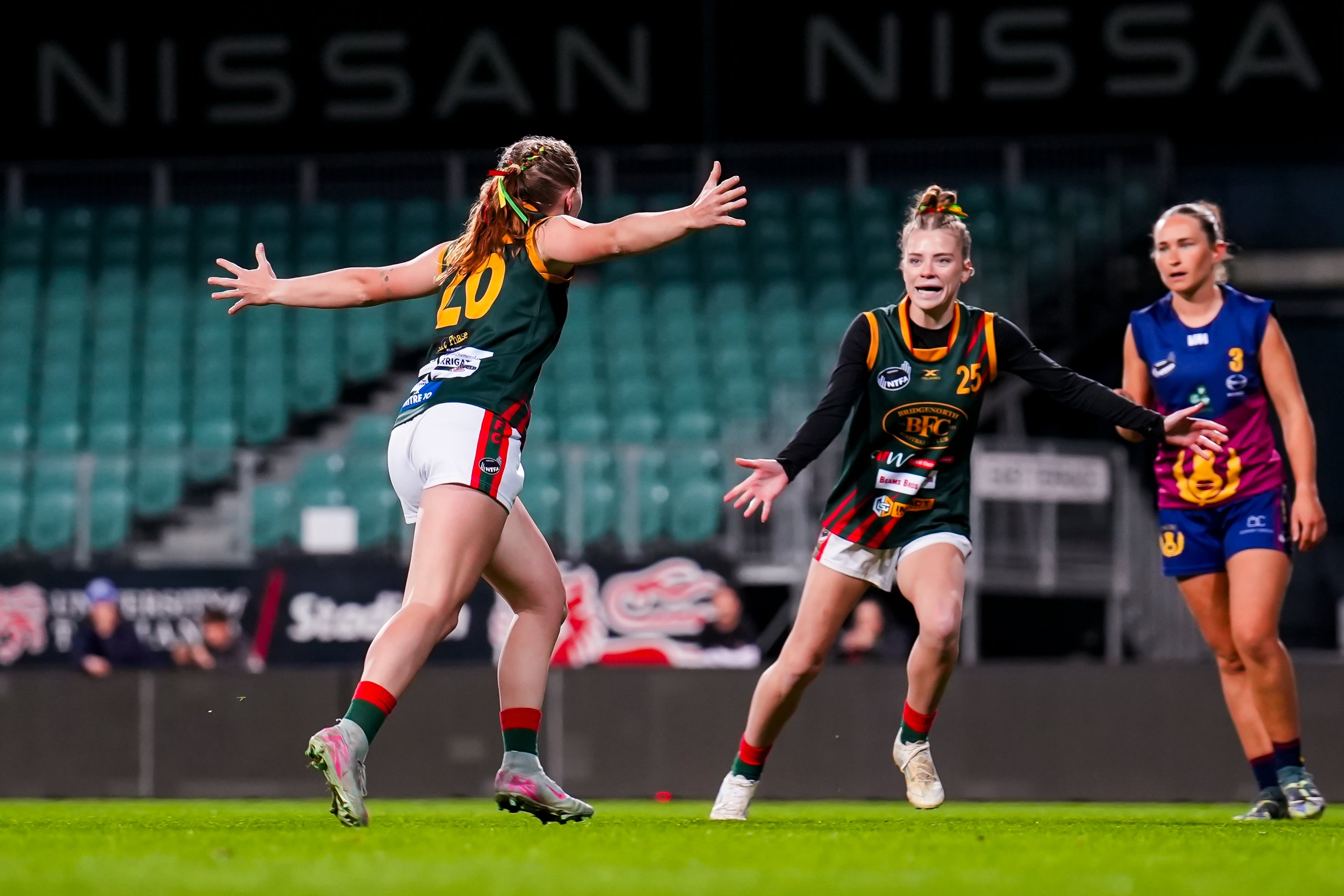 Bridgenorth Womens players celebrating a goal against Old Scotch in the 2025 Grand Final