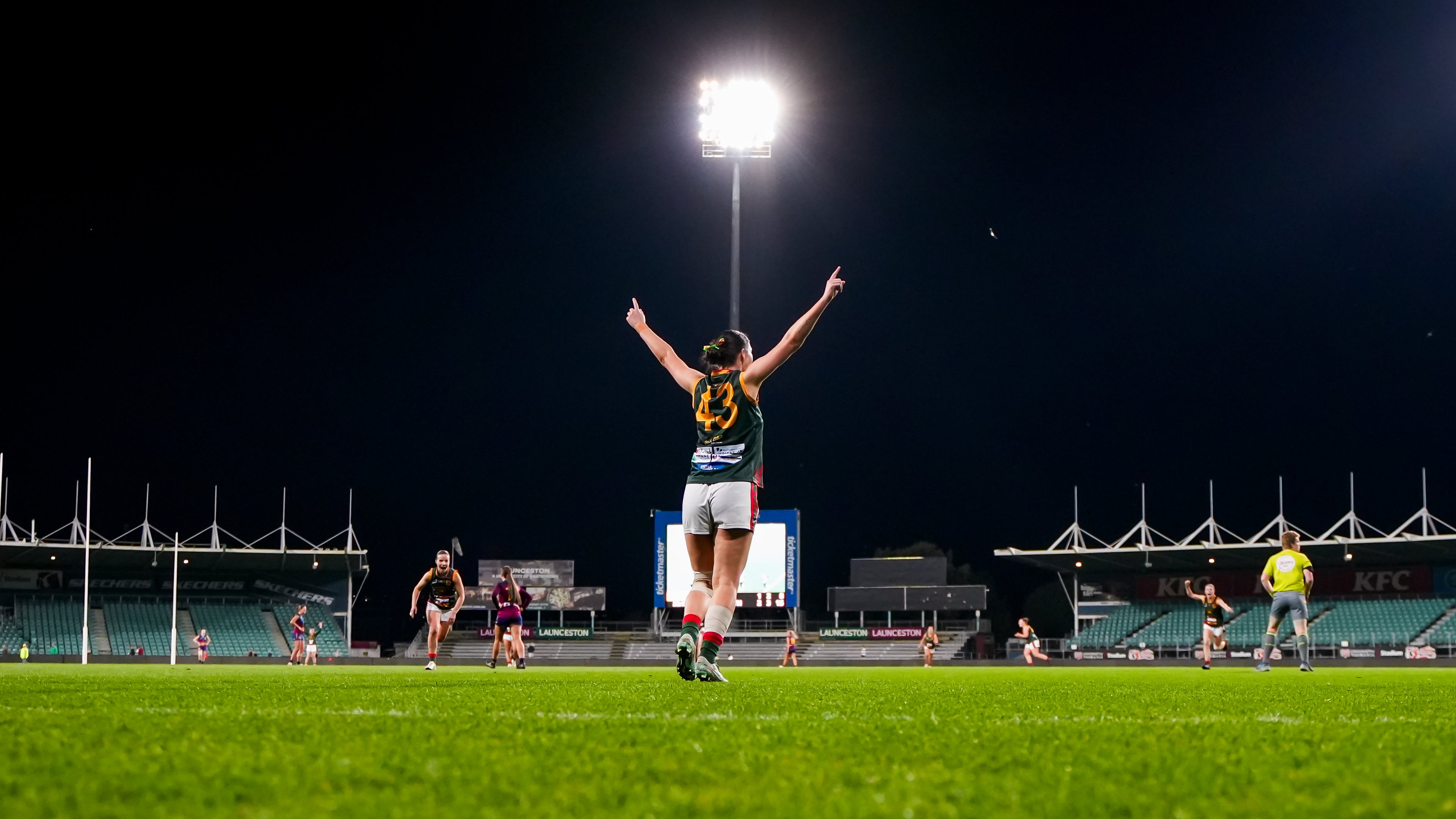Bez celebrating a goal at the 2025 grand final 