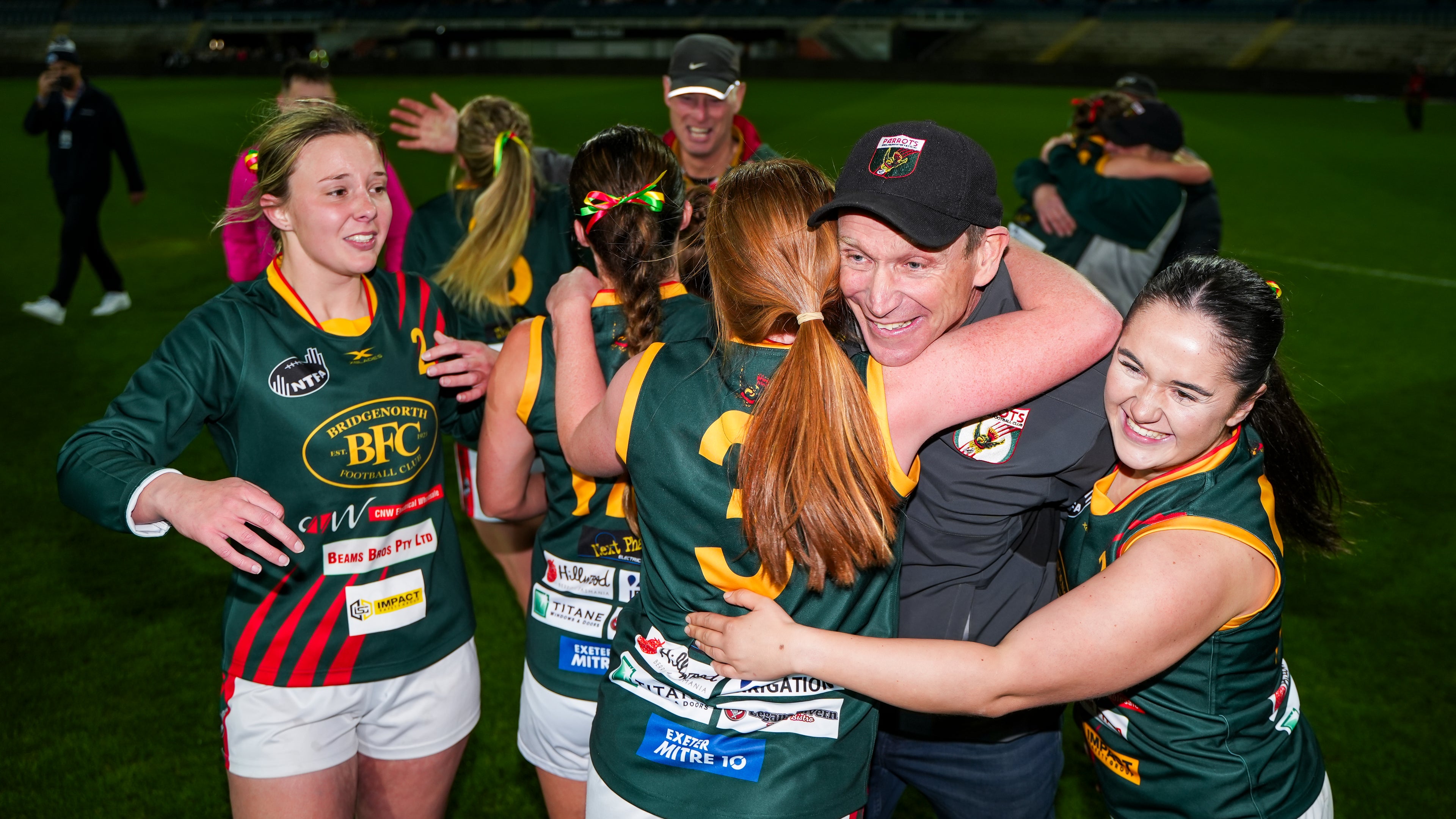 Senior Womens team celebrating the 2025 grand final win