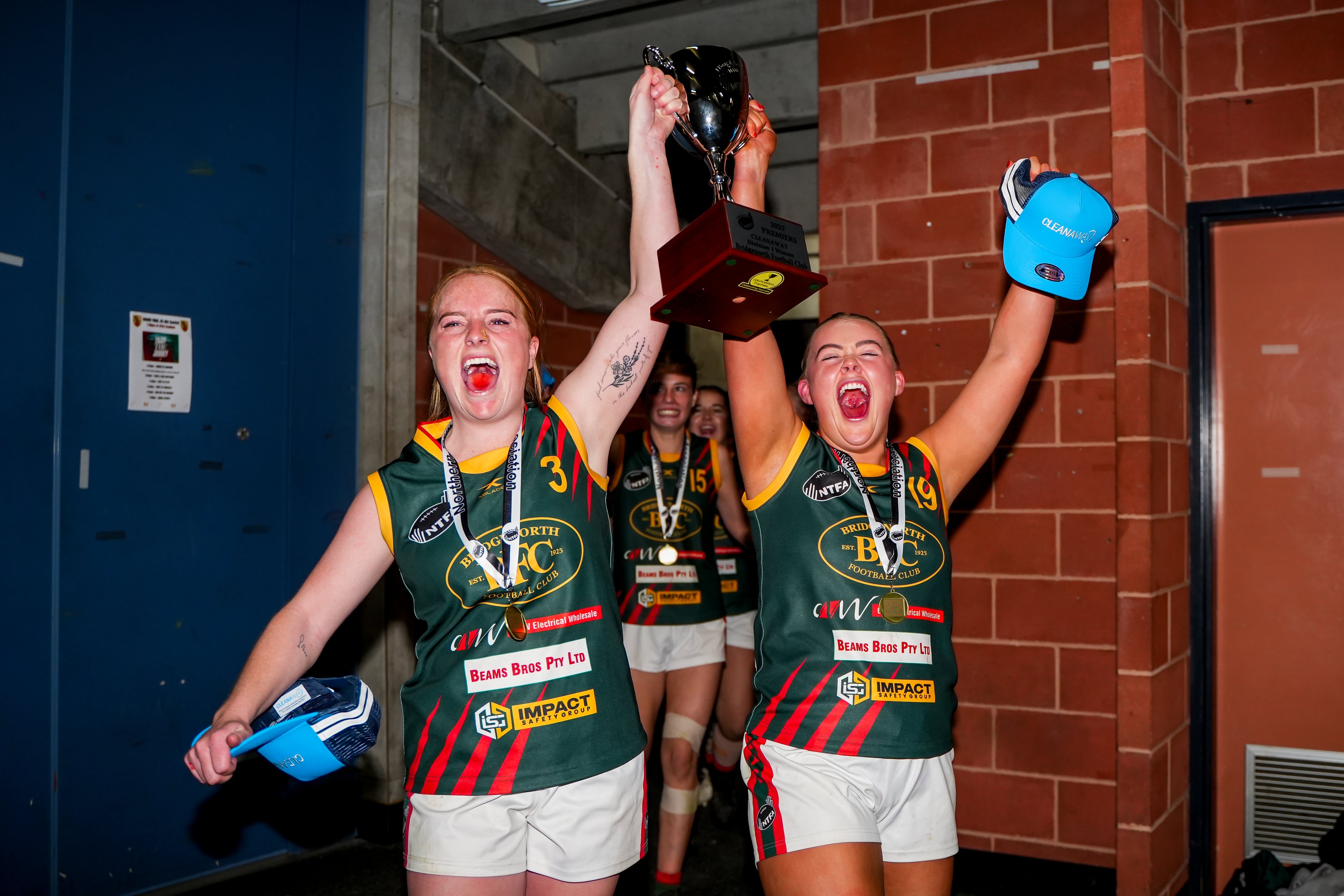 Jenna and Emma celebrating the 2025 Grand Final win