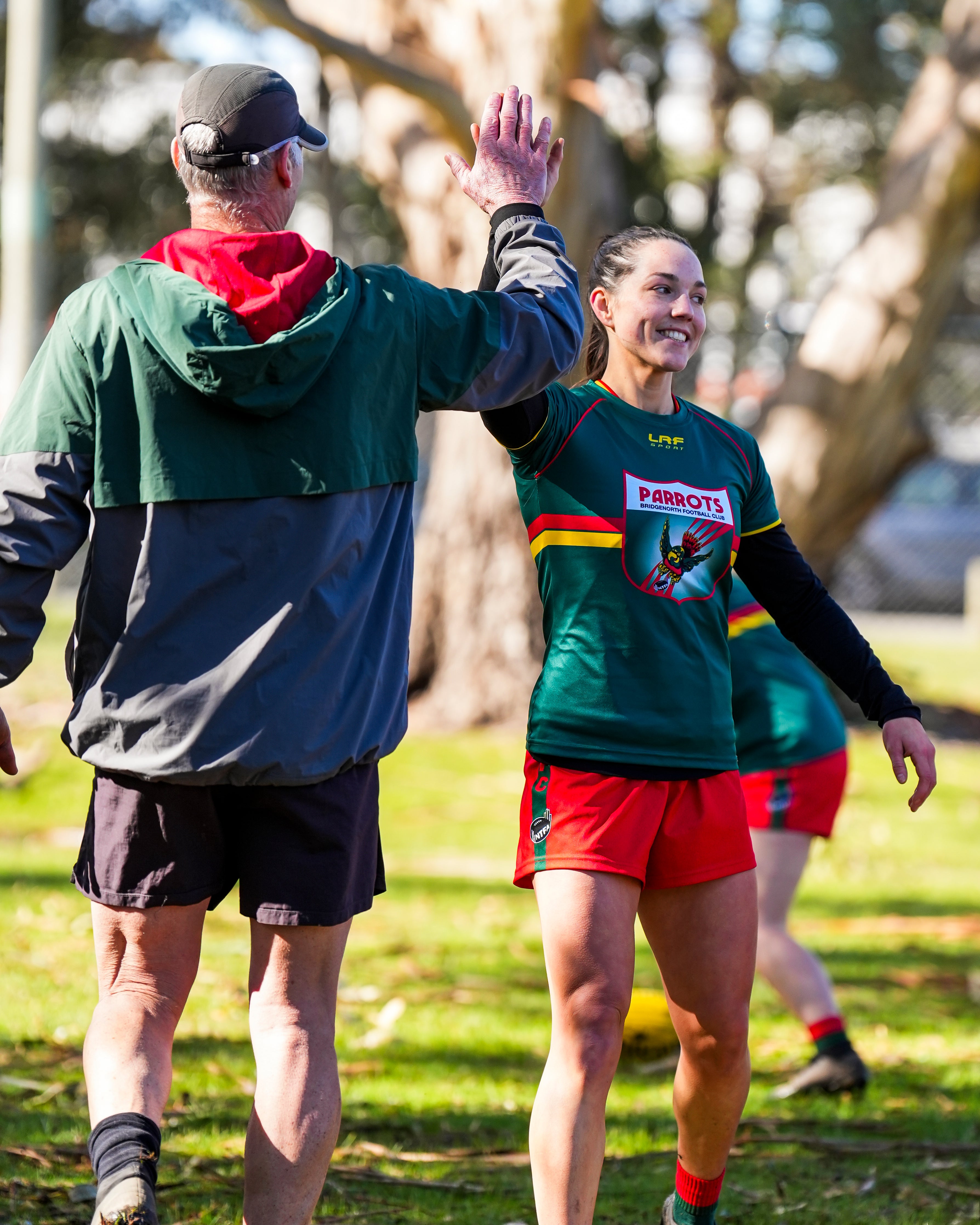 Zahara and Robbo high fiving during warm up for semi-finals 2025