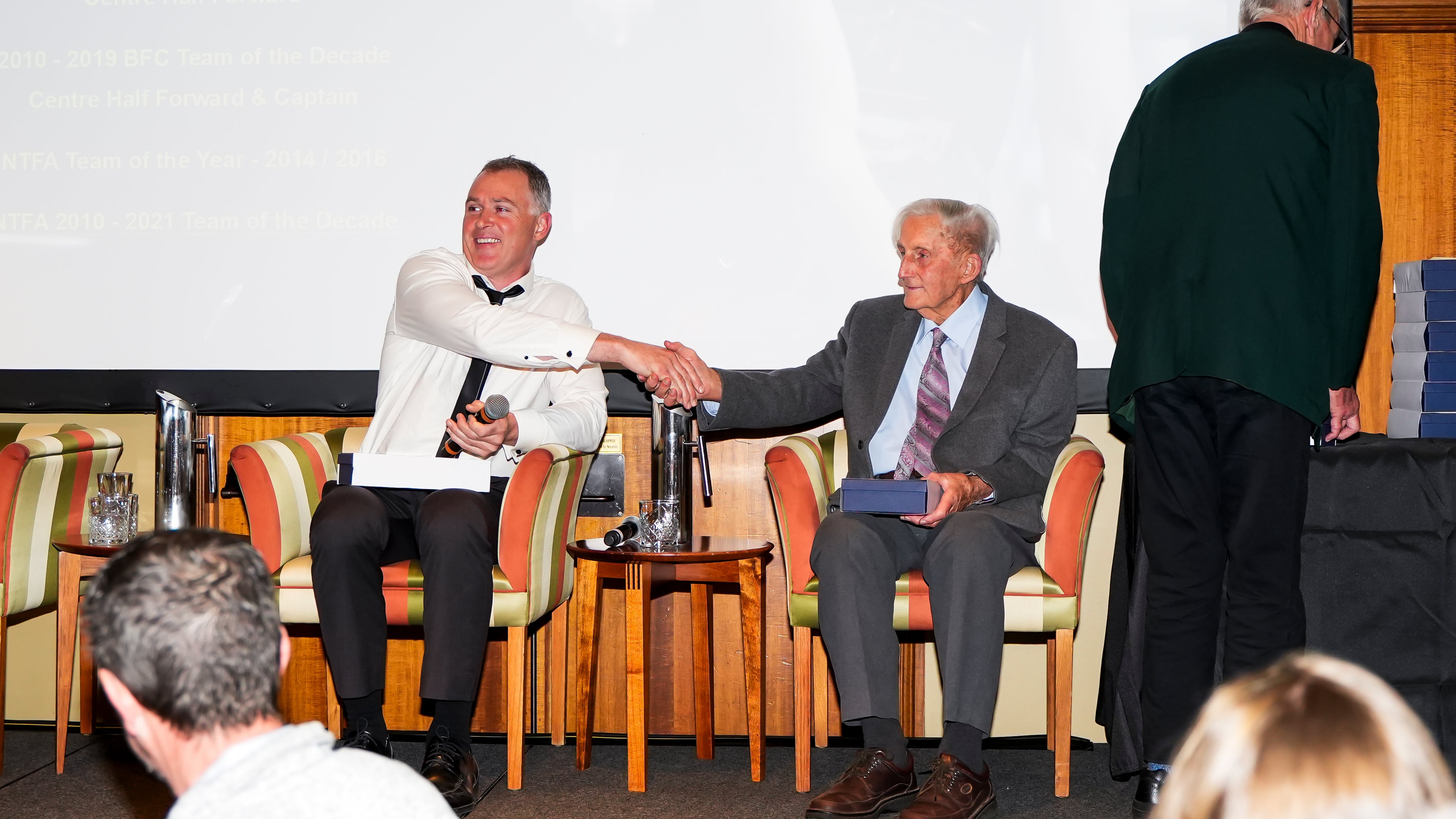 Team of the Century players on stage