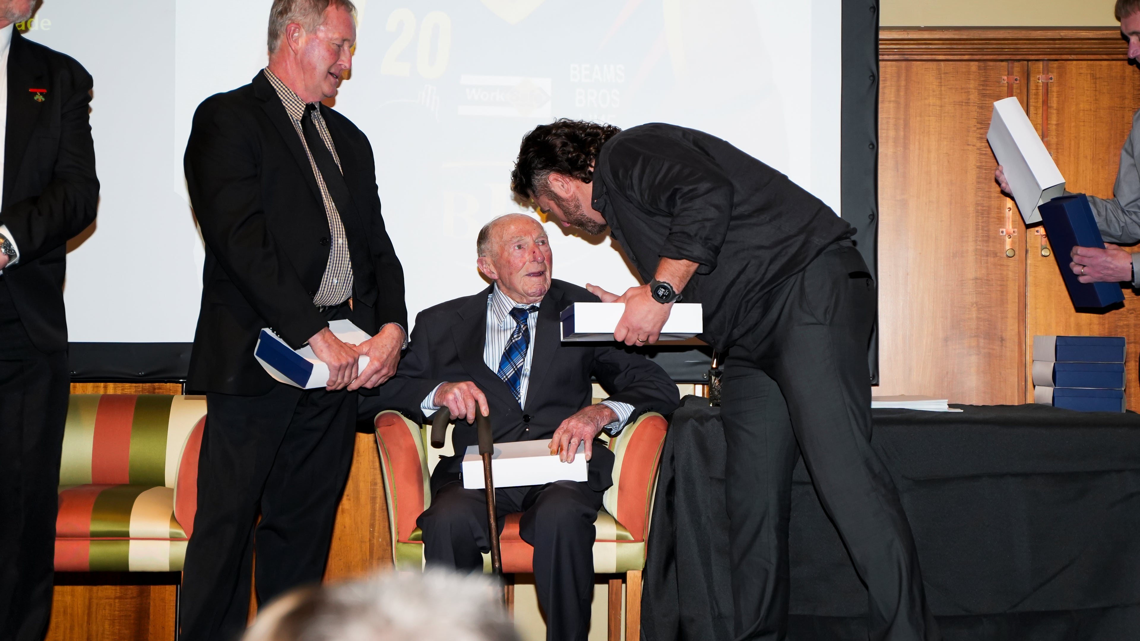 Receiving an award at the 100 year celebration