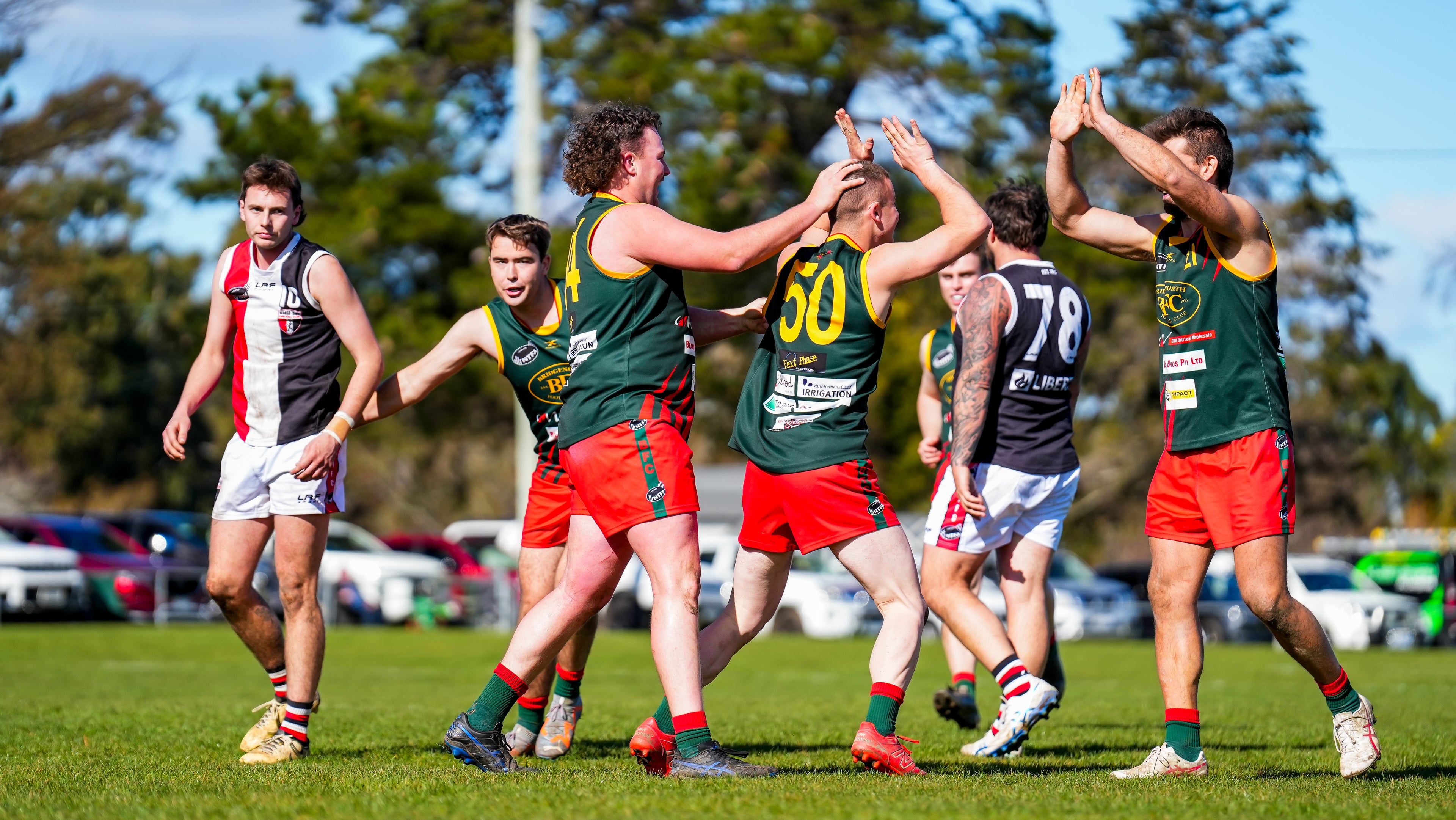 Group of Reserves players celebrating