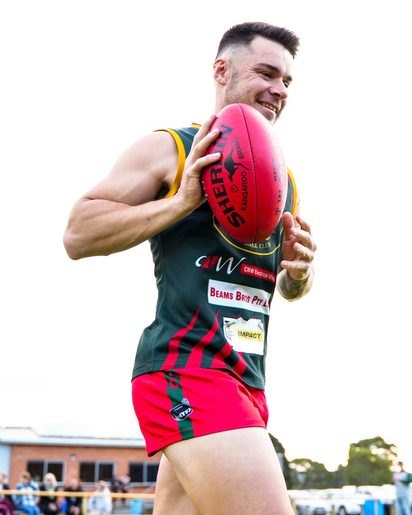 Matthew Zanetto bouncing the football