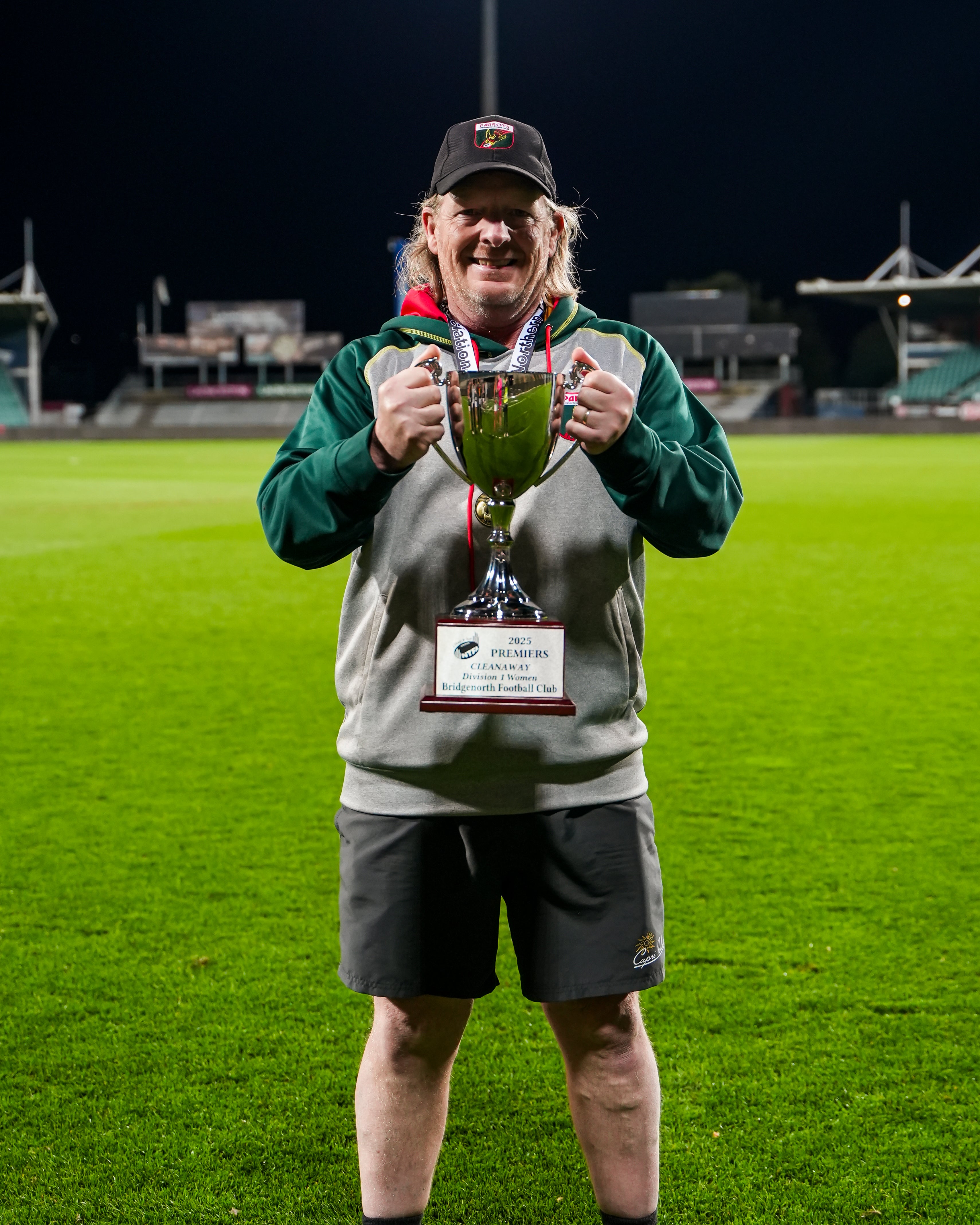 Richo holding the 2025 Grand Final Trophy