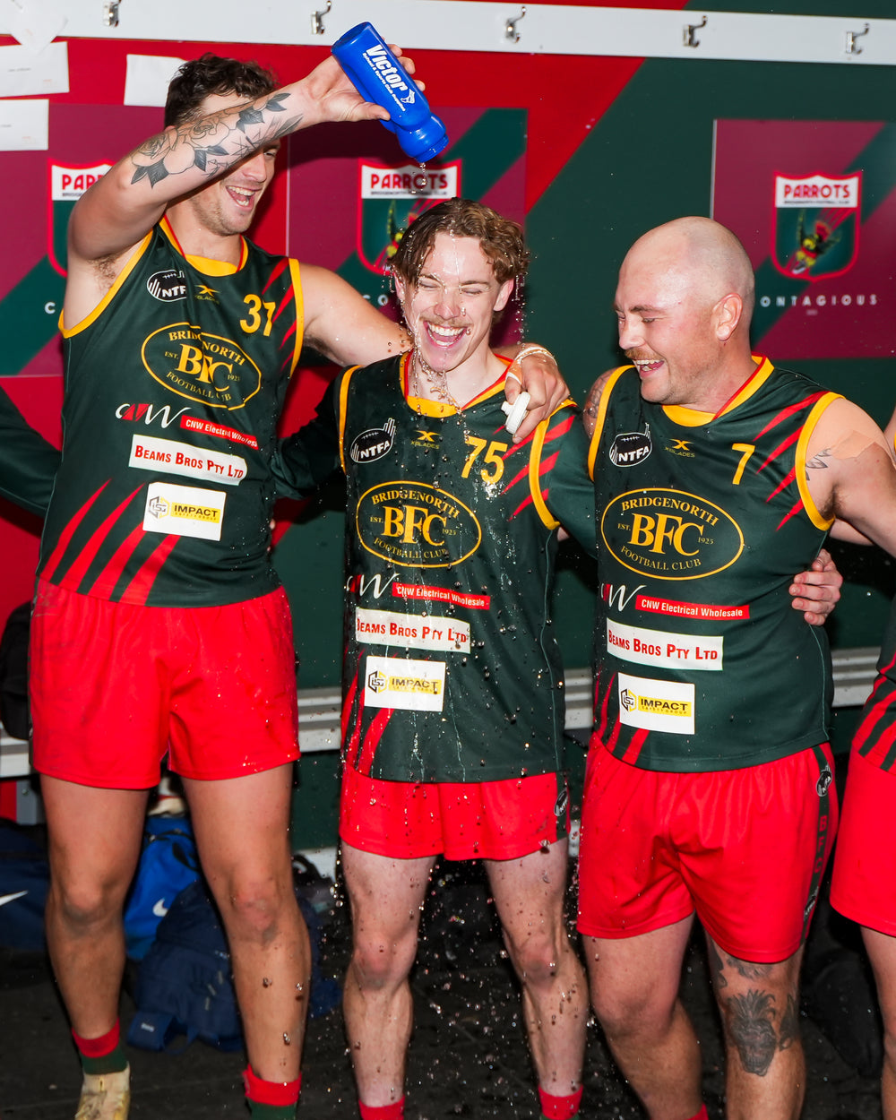 Reserves players celebrating in the Bridgenorth Football Club clubrooms