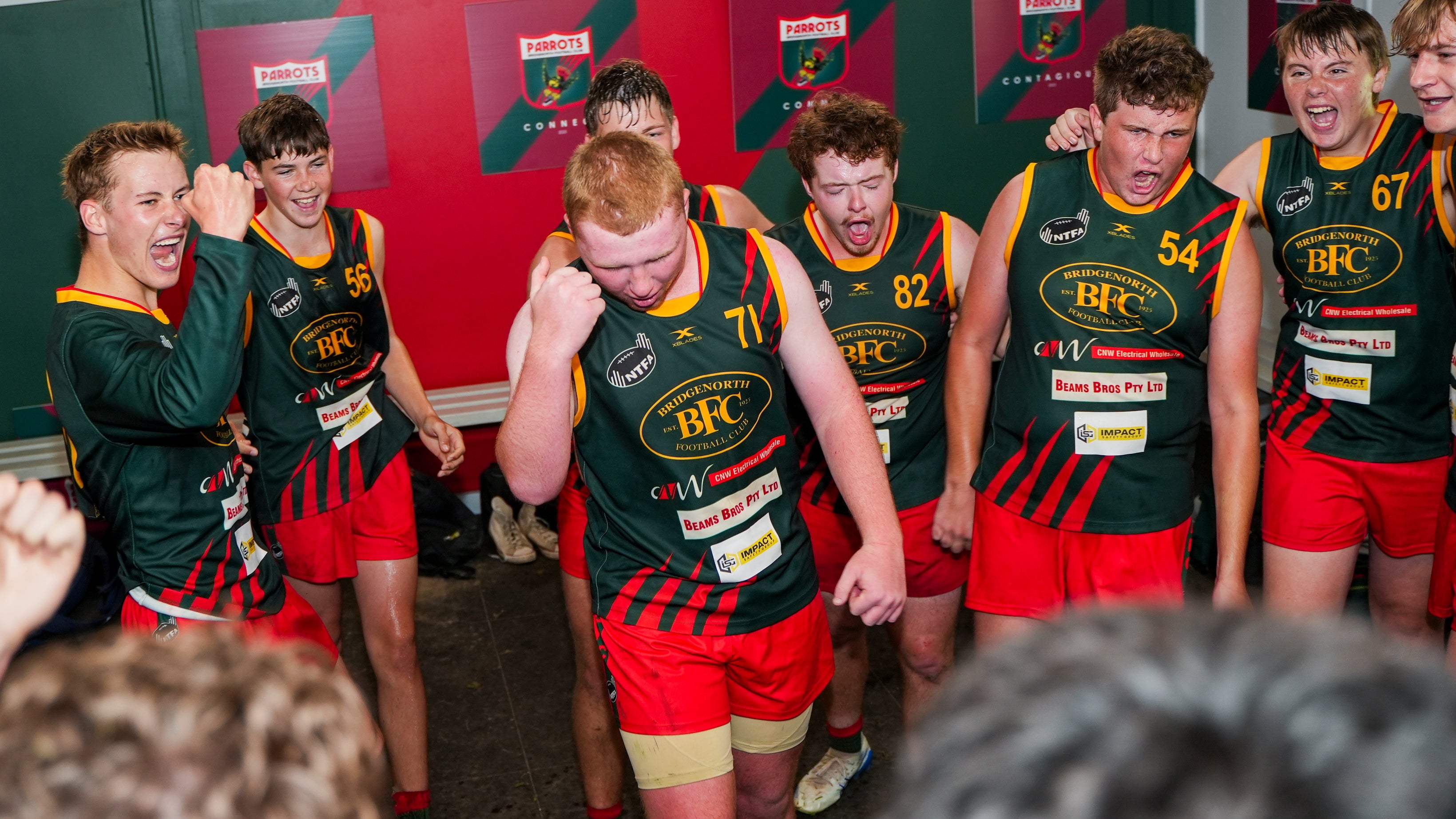 Under 18.5s celebrating in the Bridgenorth Football Club club rooms